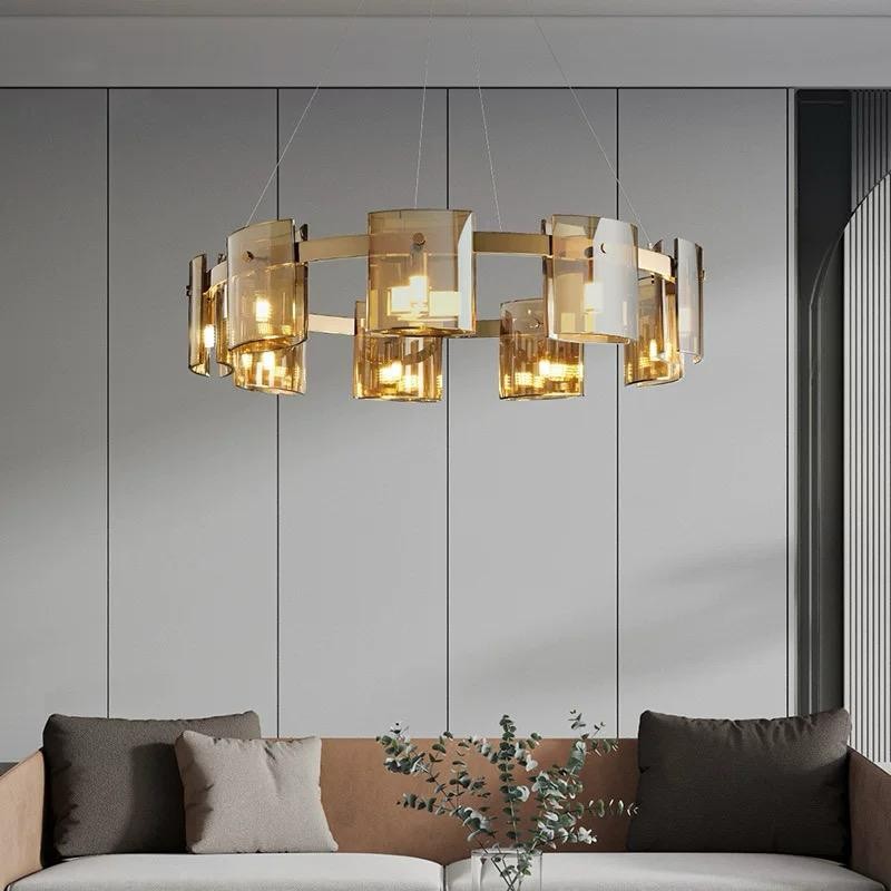 Lustra circulara cu sticla amber G9 x 9, suspendata in living modern deasupra canapelei