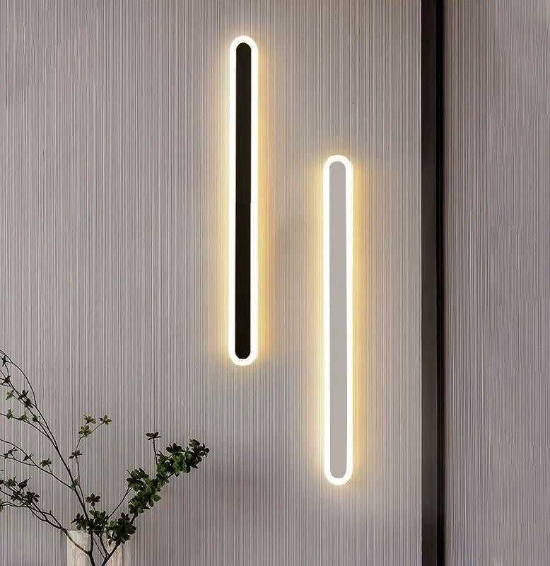 Aplica LED bar subtire disponibila in finisaj negru si alb, lumina ambientala uniforma pe perete
