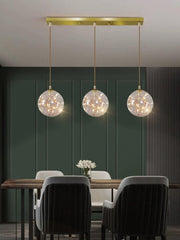 Lustra LED suspendata 3 globuri sticla transparenta, 24W, IP20, lumina neutra, structura metalica aurie, deasupra mesei de dining