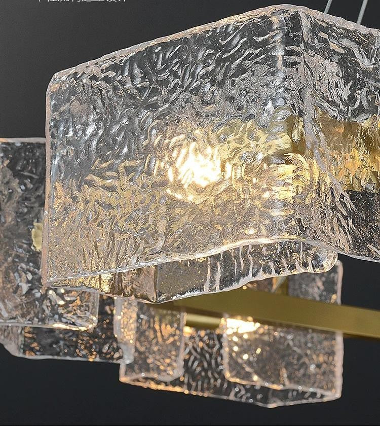 lustra liniara suspendata cu 6 abajururi din sticla texturata efect val, soclu E14, finisaj auriu mat, 700mm