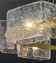 Lustra suspendata cu 8 abajururi cubice din sticla texturata, soclu E14, bara aurie, design modern luxury