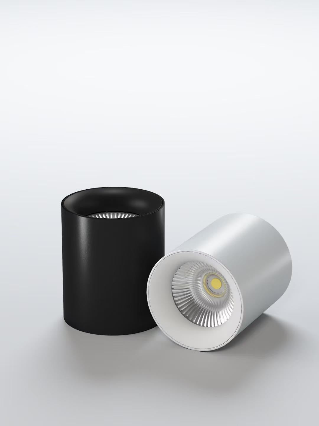 Spot LED aplicat 7W, 700 lumeni, 4000K, corp cilindric din metal, disponibil in negru si alb