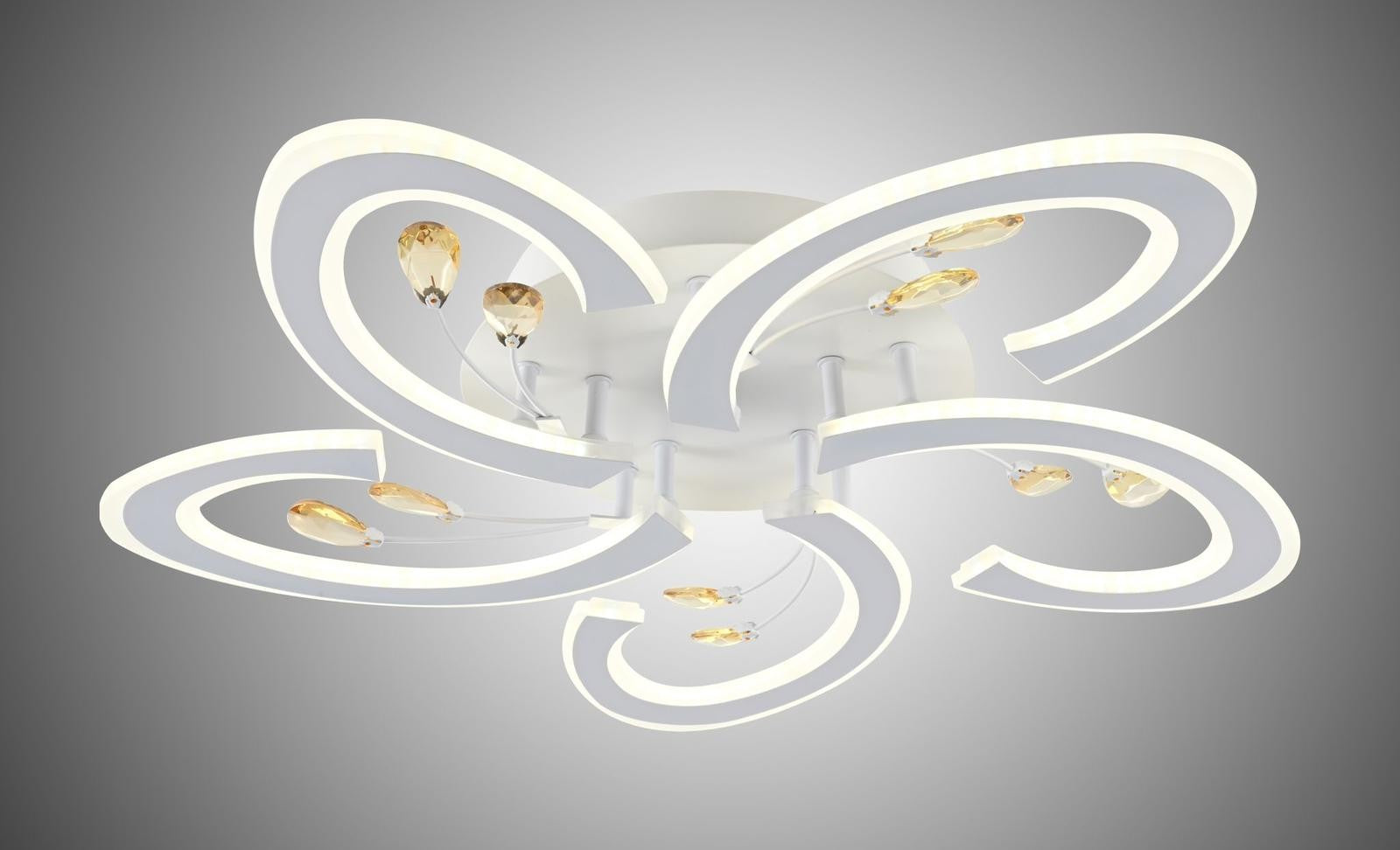Lustra LED tip floare spiralata cu cristale decorative ambrate, vedere de aproape pe fond neutru