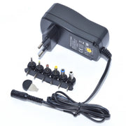 Alimentator stabilizat 220V cu tensiune reglabila 3-12V/1500mah si iesire USB